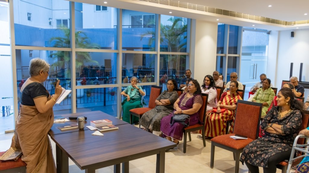 Mangal Karnad reading Malli and the Mulky stories to the residents of a senior living facility